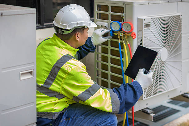 Professional Heat Pump Repair technician working in Lady Lake, FL